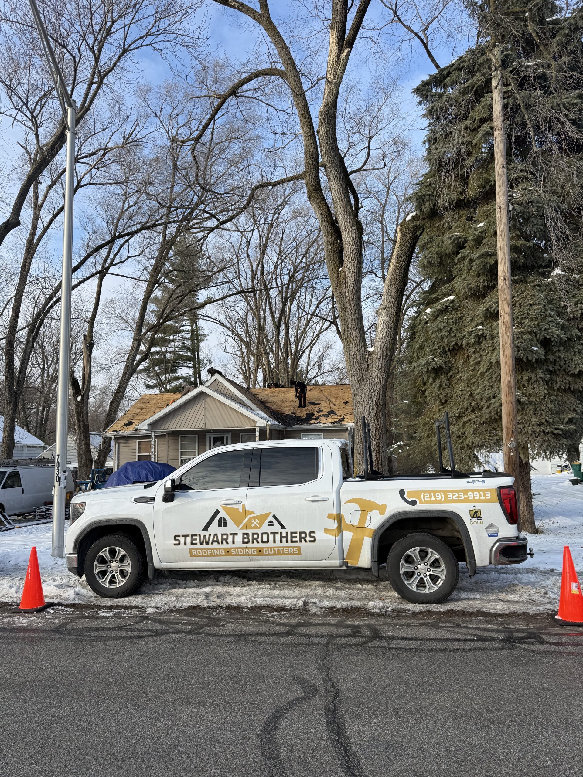 Stewart Brothers roofing crew on site